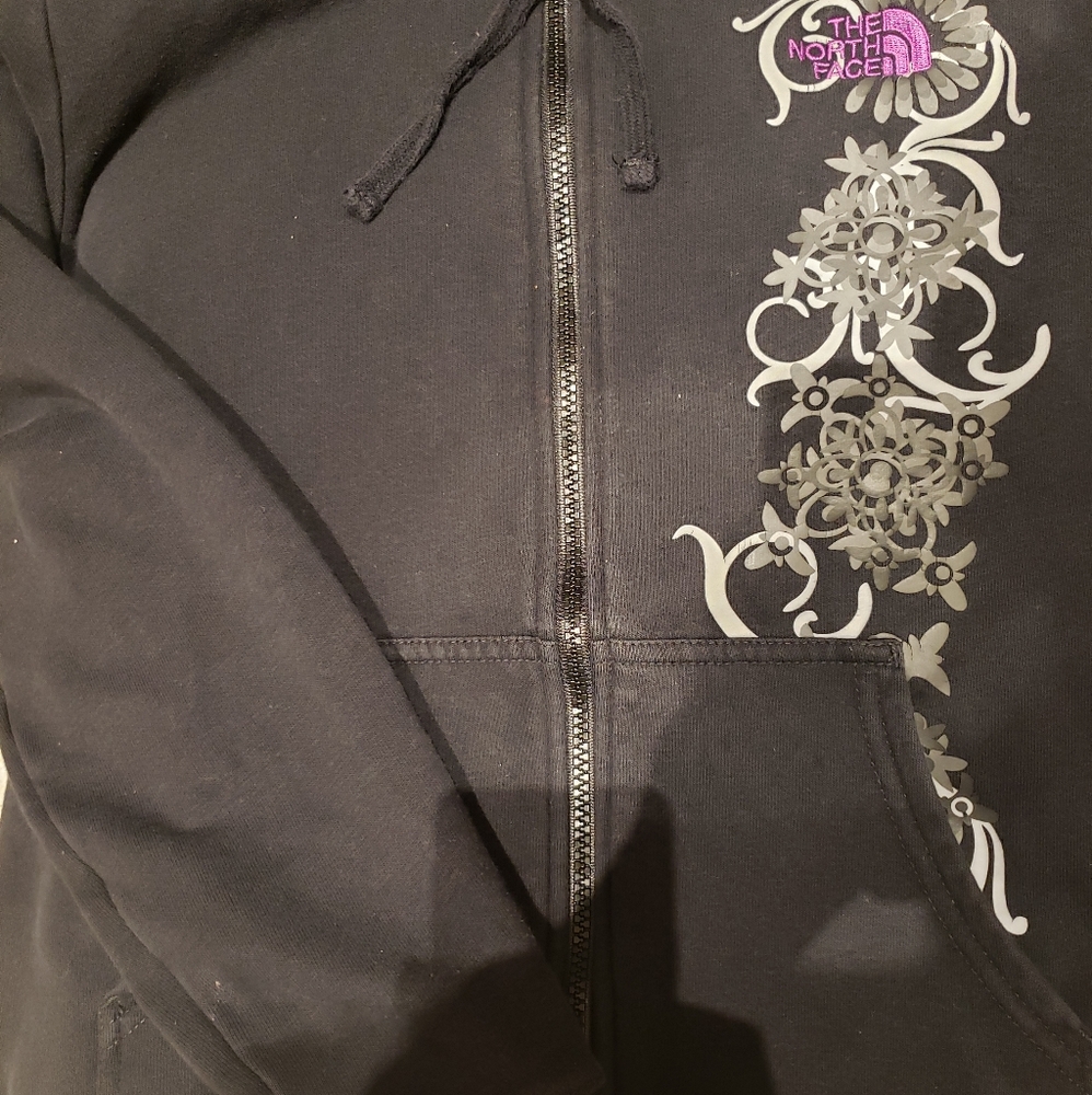 Northface black jacket with hood and beautiful left front